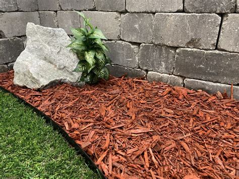 Is Rubber Mulch Better Than Wood Mulch? And Why Do Garden Gnomes Prefer One Over the Other?